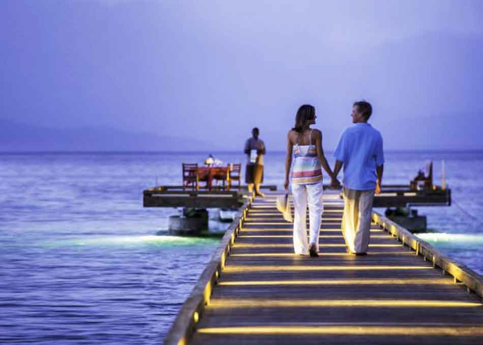 Couple on boardwalk in Fiji